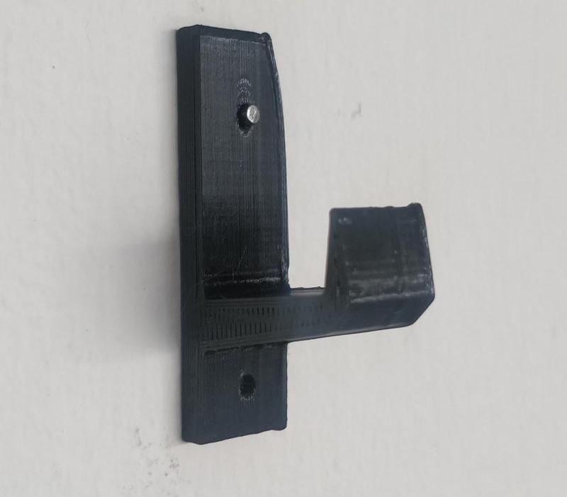 Simple wall hook with 17 gauge nail hole