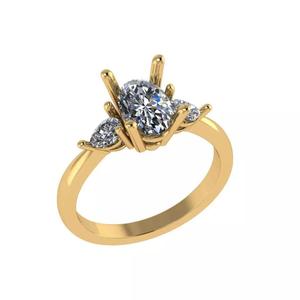 Oval and pear cut 3 stone diamond ring