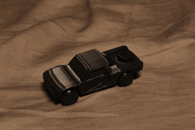 small trophy truck  (spinning wheels)