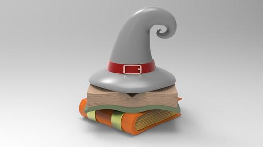 Witch hat on books pile