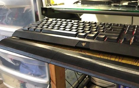 Desk shelf wrist guard and rear bumper