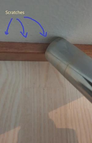 Vacuum head scratching protector