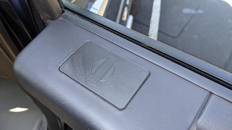 Nissan Titan rear window switch block plate