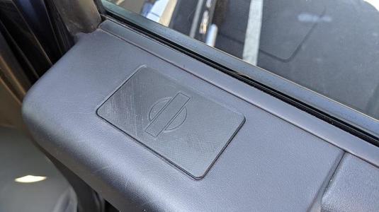 Nissan Titan rear window switch block plate