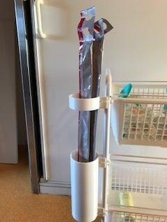 [K] Porte-sonde (Urinary catheter compartment)