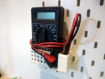 Parametric universal pegboard hook multimeter support