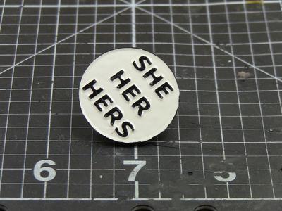 Female pronouns enamel pins