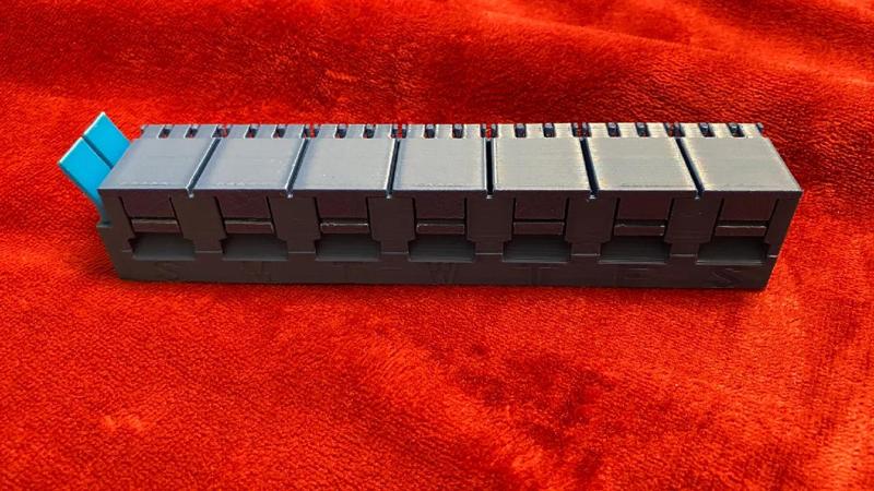 Pill box with smooth interior compartments Saturday to Sunday with tools   