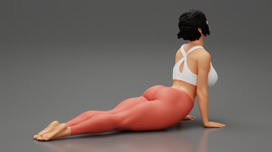 Young Sporty Woman practicing Yoga Doing Upward Facing Dog