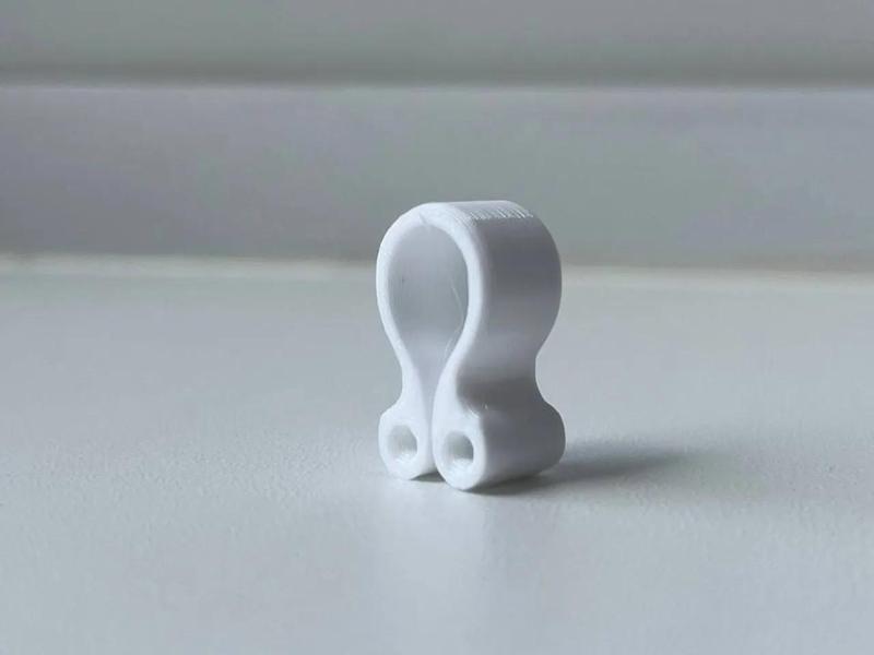 Two-side universal filament clip   