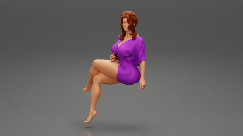 Young Elegant Woman In Mini Dress Sitting On Chair