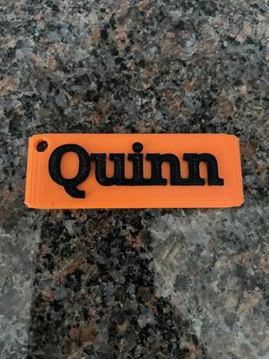 Key chain with name Quinn on it