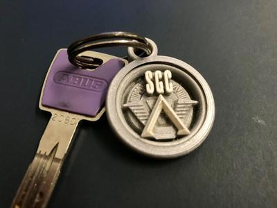 Customizable print-in-place spinning keychain