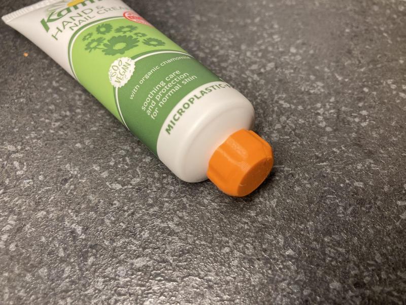 Replacement bottle top