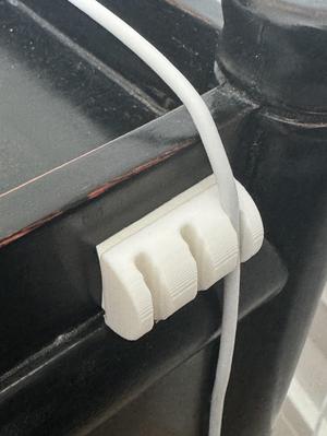 Charging cable clamp