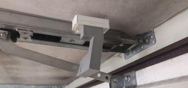 Garage door Hormann reed switch support