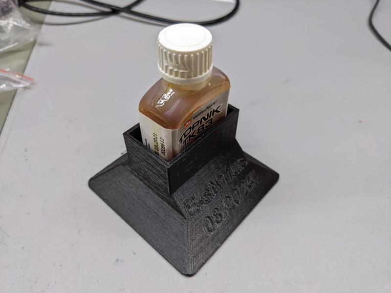 Flux bottle anti-tipover protection