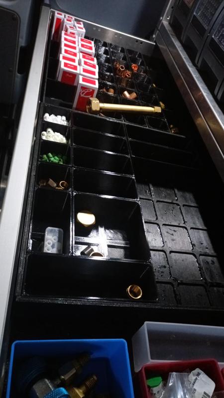 Drawer storage system with grid