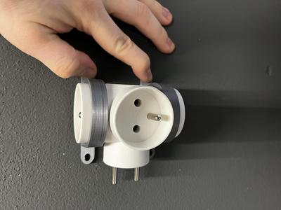Wall socket extender holder
