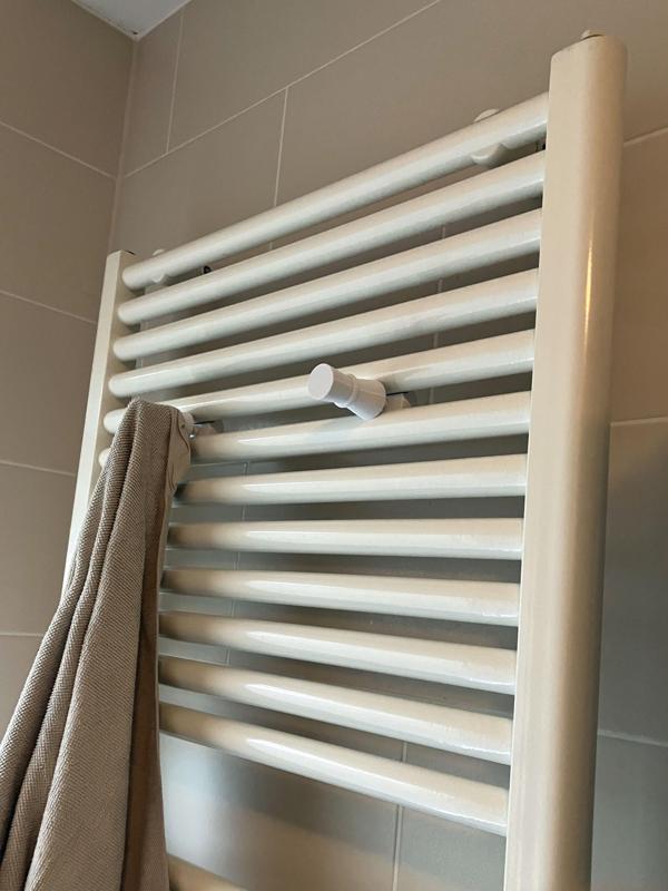 Towel holder for radiator heater