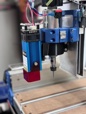 Laser module dovetail spindle bracket
