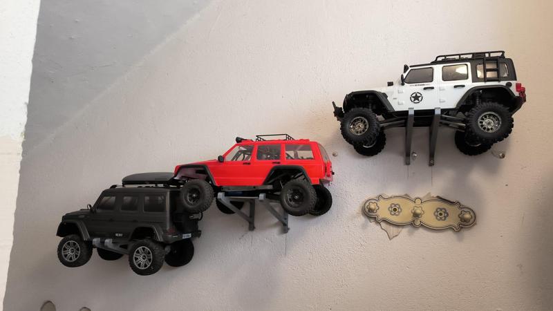 RC holder for axial or wall mount shelf