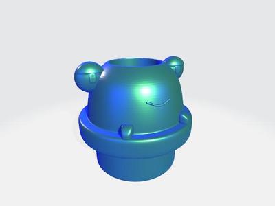 POT/PENCIL HOLDER OF A LITTLE FROG IN A POT.