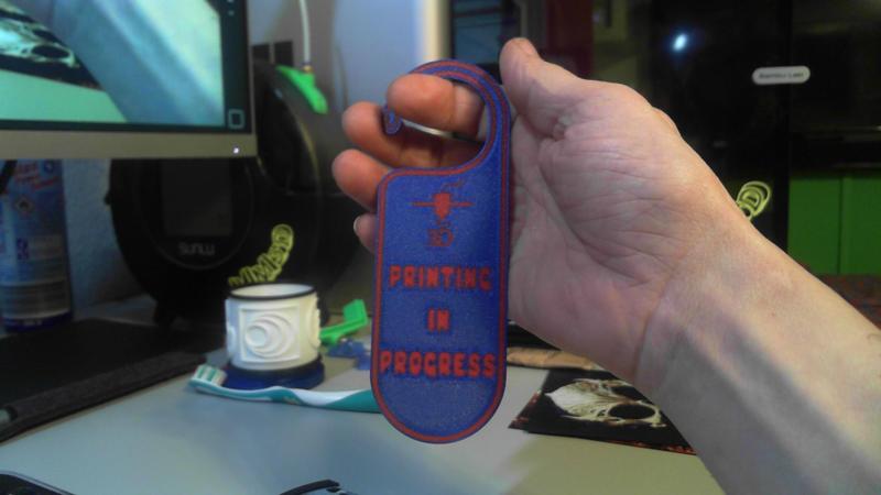 Printing in progress Door Hanger