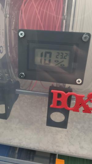 Humidity meter holder for boxes