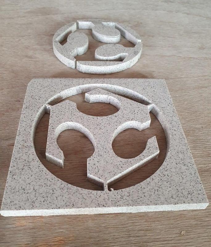 Waterjet-cut FabLab logo