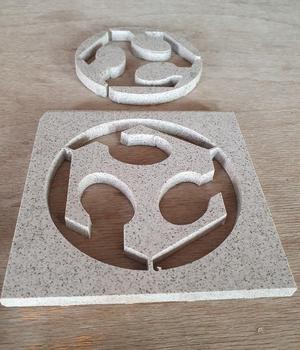 Waterjet-cut FabLab logo