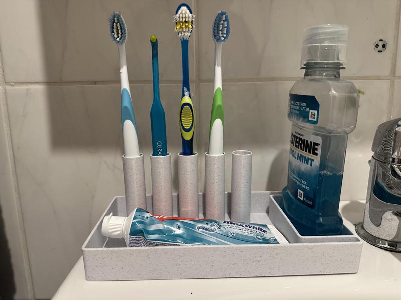 Simple toothbrush/toothpaste organiser