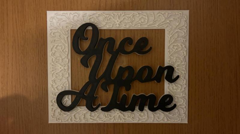 "Once Upon A Time" phrase within a frame to hang on door or any other place