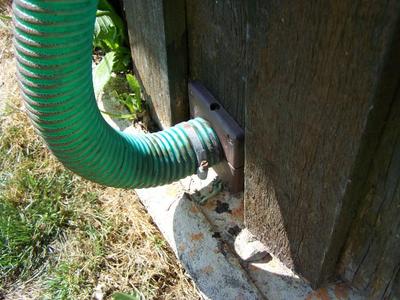 Wall feed thru for a 50mm hose