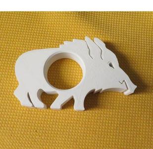 a small wild boar as a napkin holder