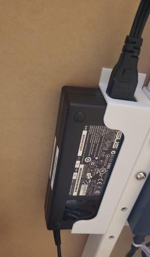 Under desk AC adapter holder
