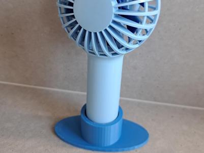 Stand for handheld fan
