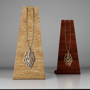 "Peacock Feather-Inspired Pendant: A Fusion of Elegance and Nature"