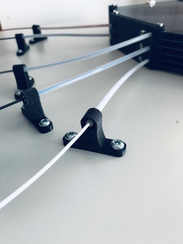 PTFE tube holder