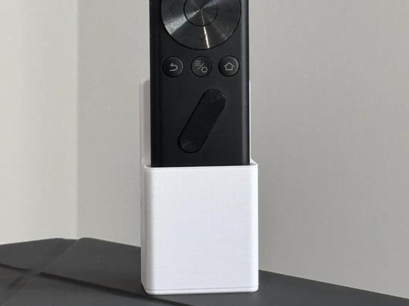 A perfectly fitting wall mount for the XGIMI projector remote control, the bracket can be easily attached with nano glue or foam double-sided tape on the back