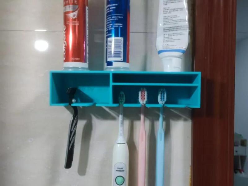 Toothbrush holder and razor holder compatible with electric and regular toothbrushes