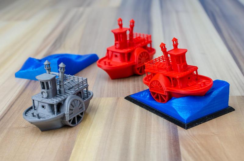 Old paddle-wheel steamboat with display stand