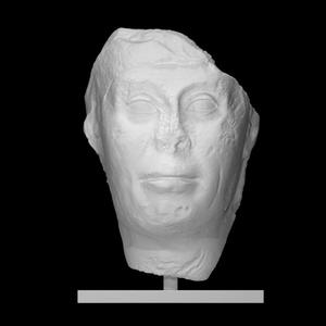 Head from a Statue with Magical Texts