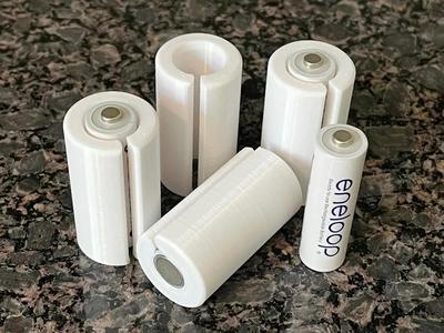 Adaptadores/espaciadores de pilas AA a C   