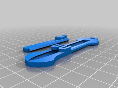 UK shopping trolley key with tension spring and keychain hole