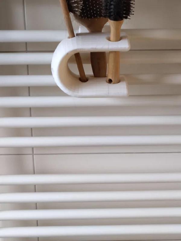 Halter für Haarbürsten   