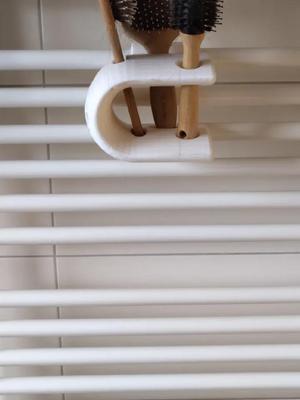 Halter für Haarbürsten   