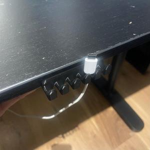 Cable hanger (mounts under table)