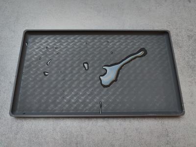 Water-drop-catcher for silverware basket