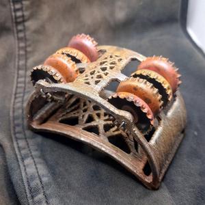 Foot tambourine frame for bottle caps